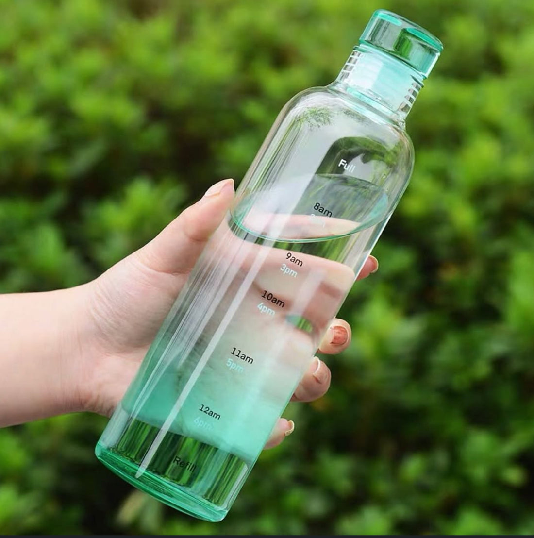 Glass water bottle with time marker