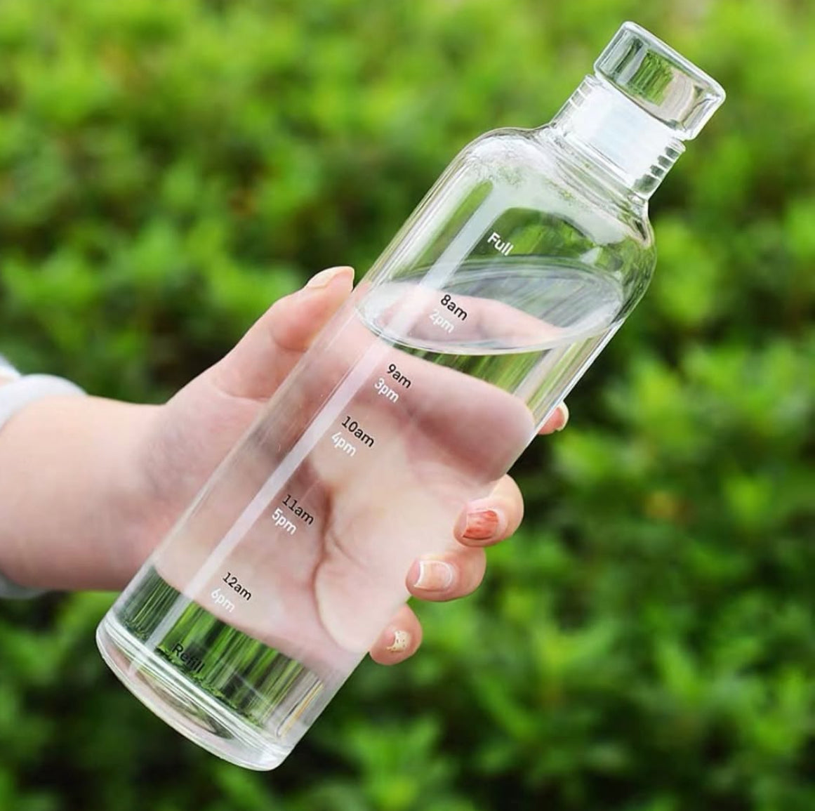Glass water bottle with time marker